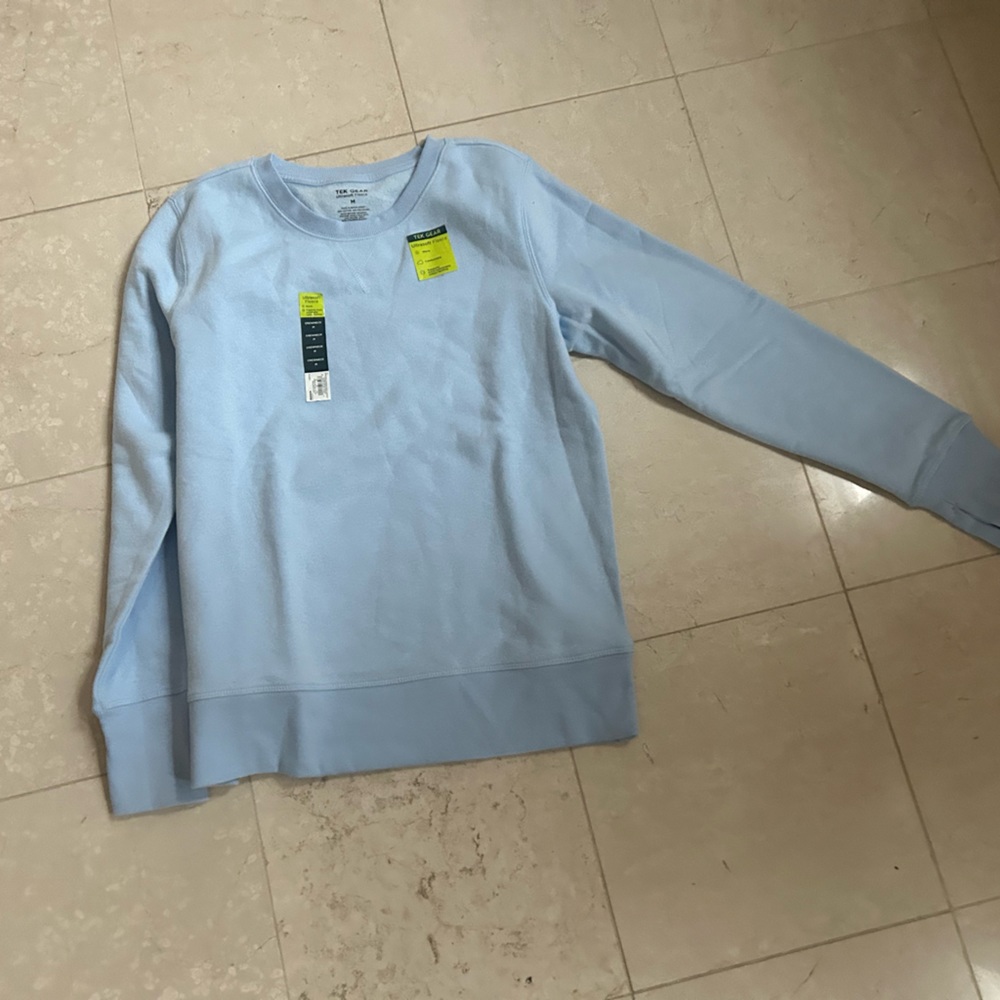 Light blue.  NEVER worn, tags on